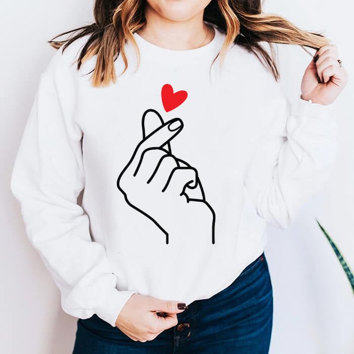 Hand To Heart: A Stylish Statement Sweatshirt
